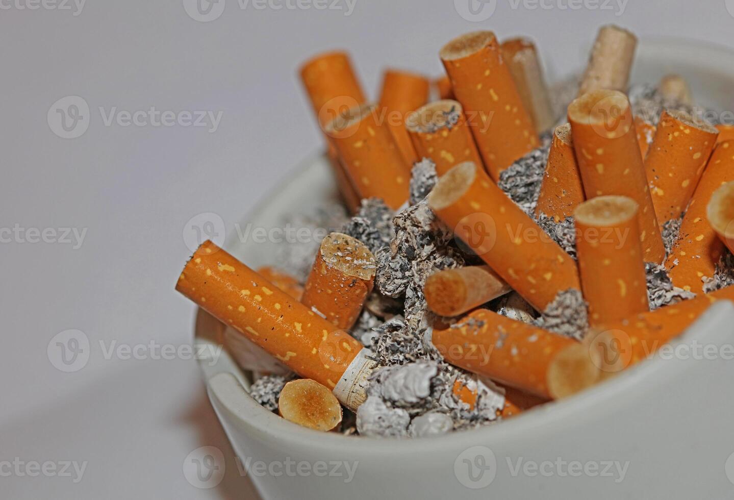 Full ashtray of cigarettes close up macro view smoking habits hi-res stock photography and images high quality big size instant download photo