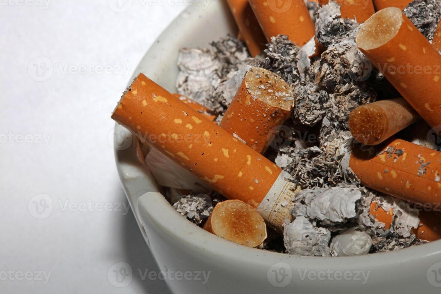 Full ashtray of cigarettes close up macro view smoking habits hi-res stock photography and images high quality big size instant download photo