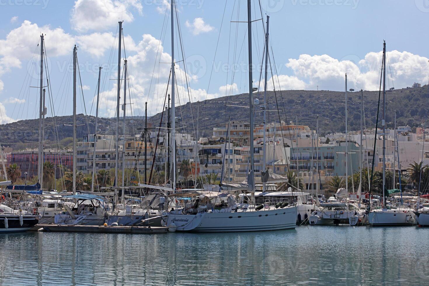 Rethimno, Greece, Friday 15 March 2024 Crete island holidays exploring the city old port riviera luxury yachts close up summer background carnival season high quality big size printings photo