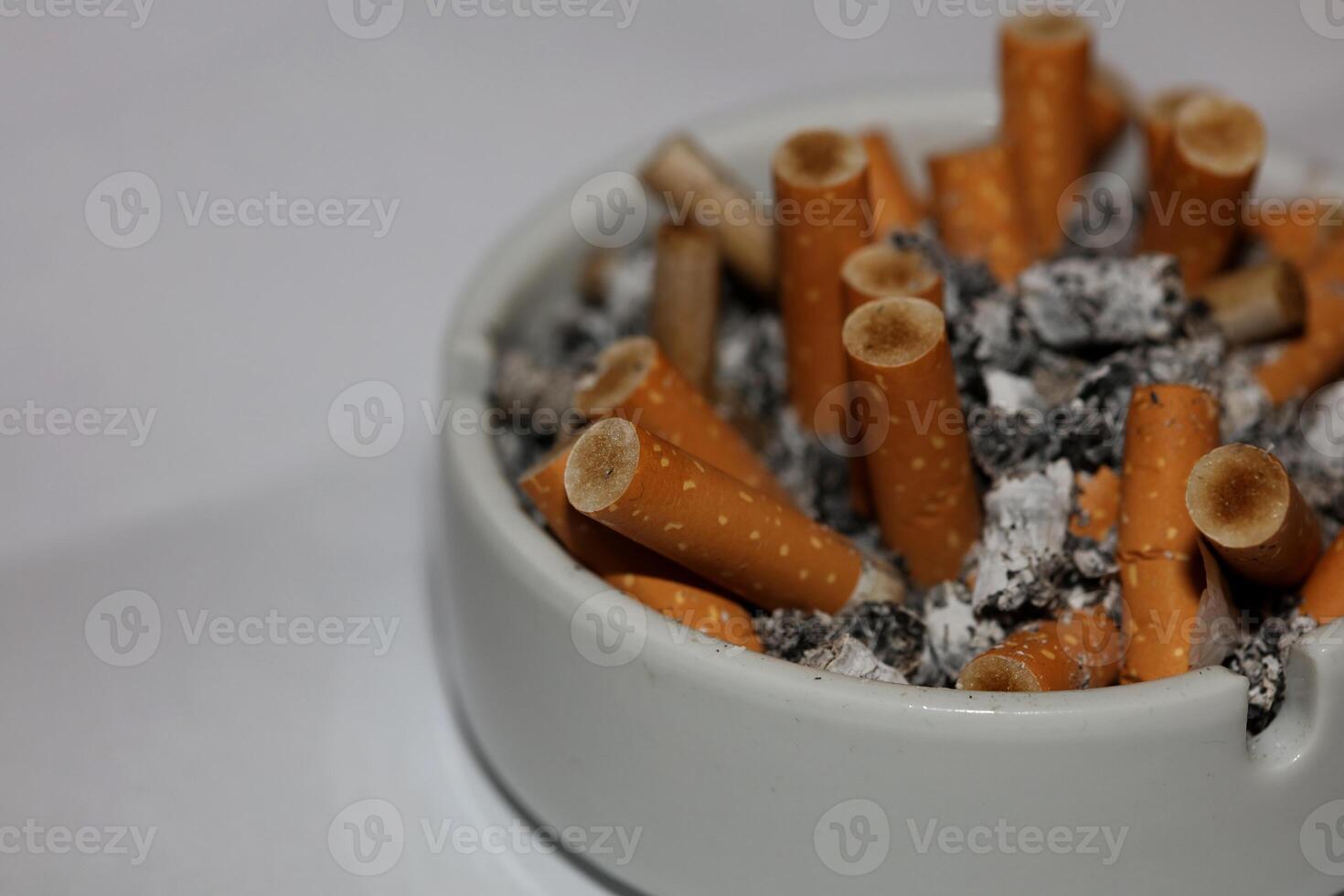 Full ashtray of cigarettes close up macro view smoking habits hi-res stock photography and images high quality big size instant download photo