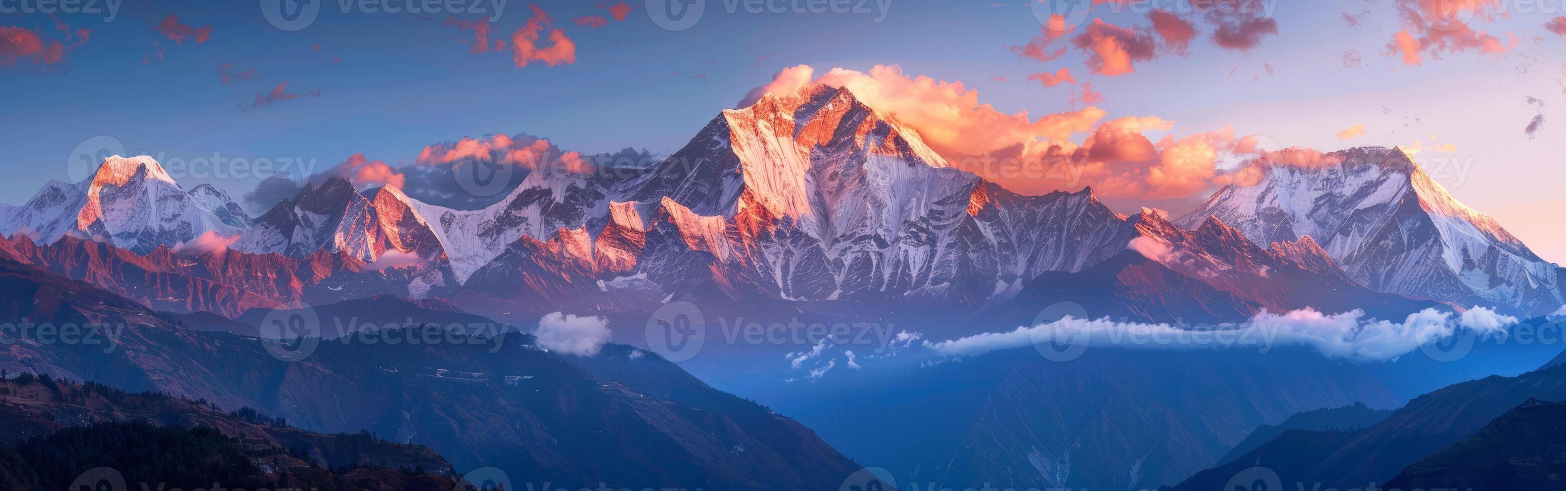 Mountain Range Silhouetted Against Sunset photo