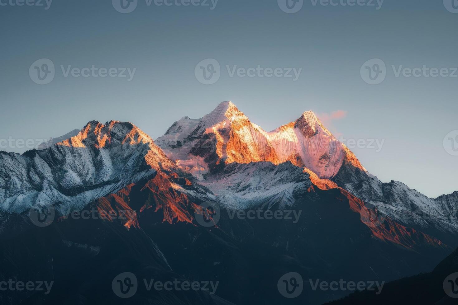 Majestic Snow Covered Mountain Against Sky photo