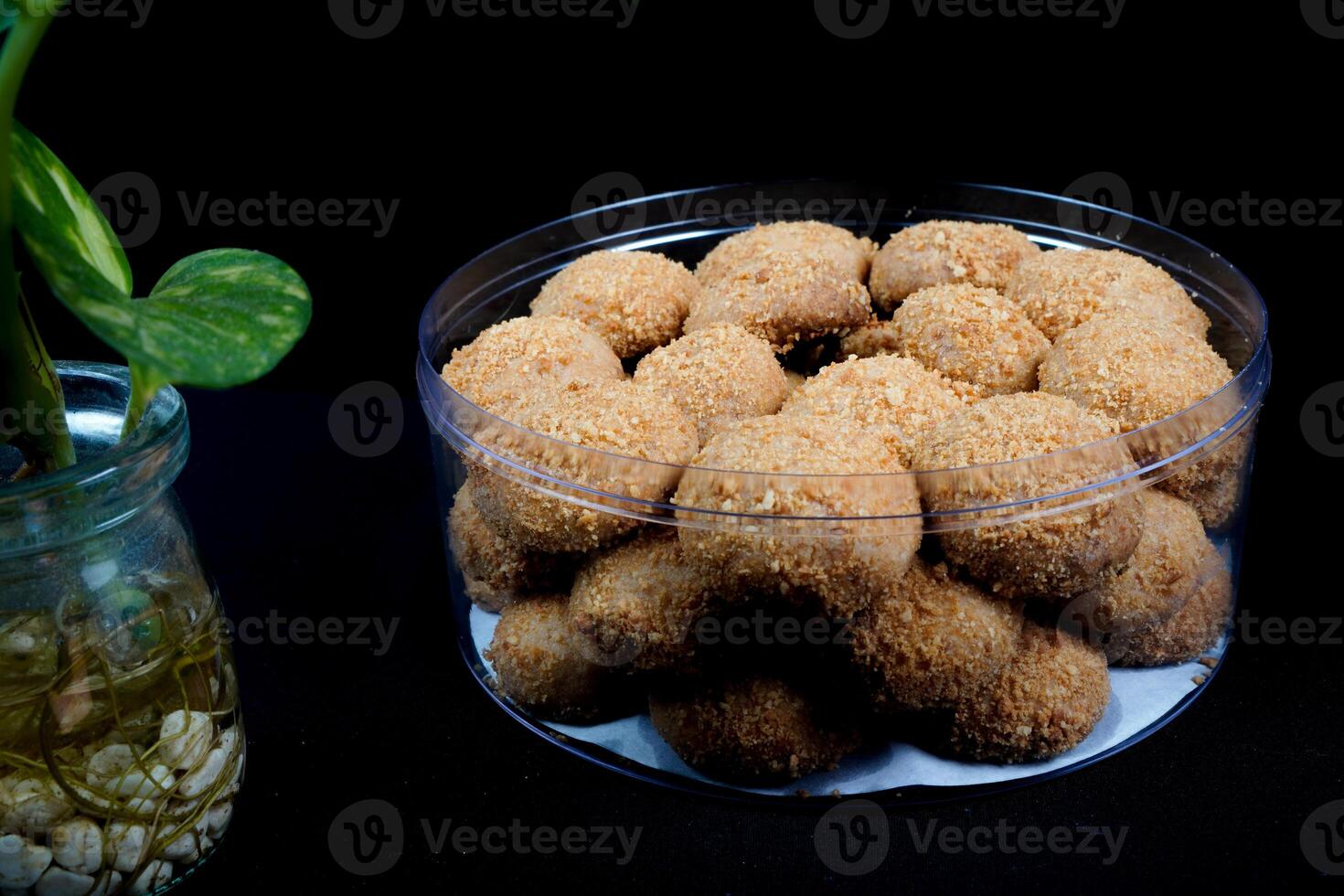 close up view of a beautiful chestnut cake on a black background. photo