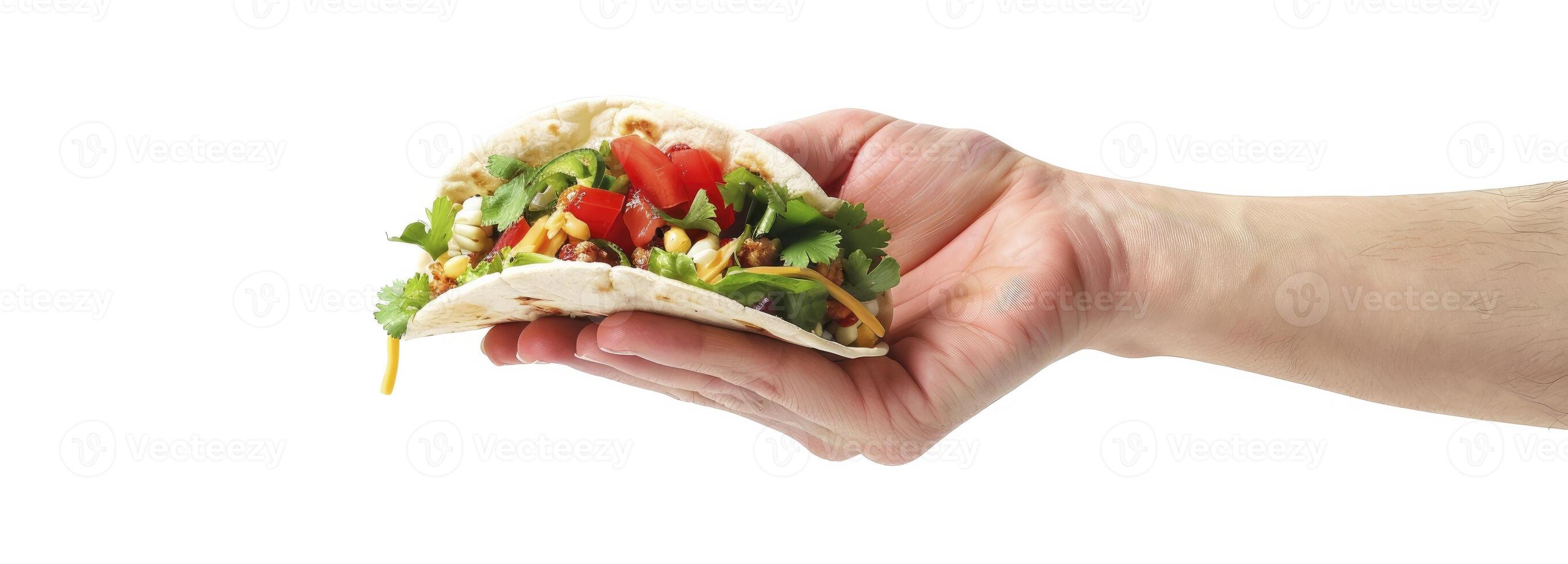 A hand holding a taco isolated on white background photo