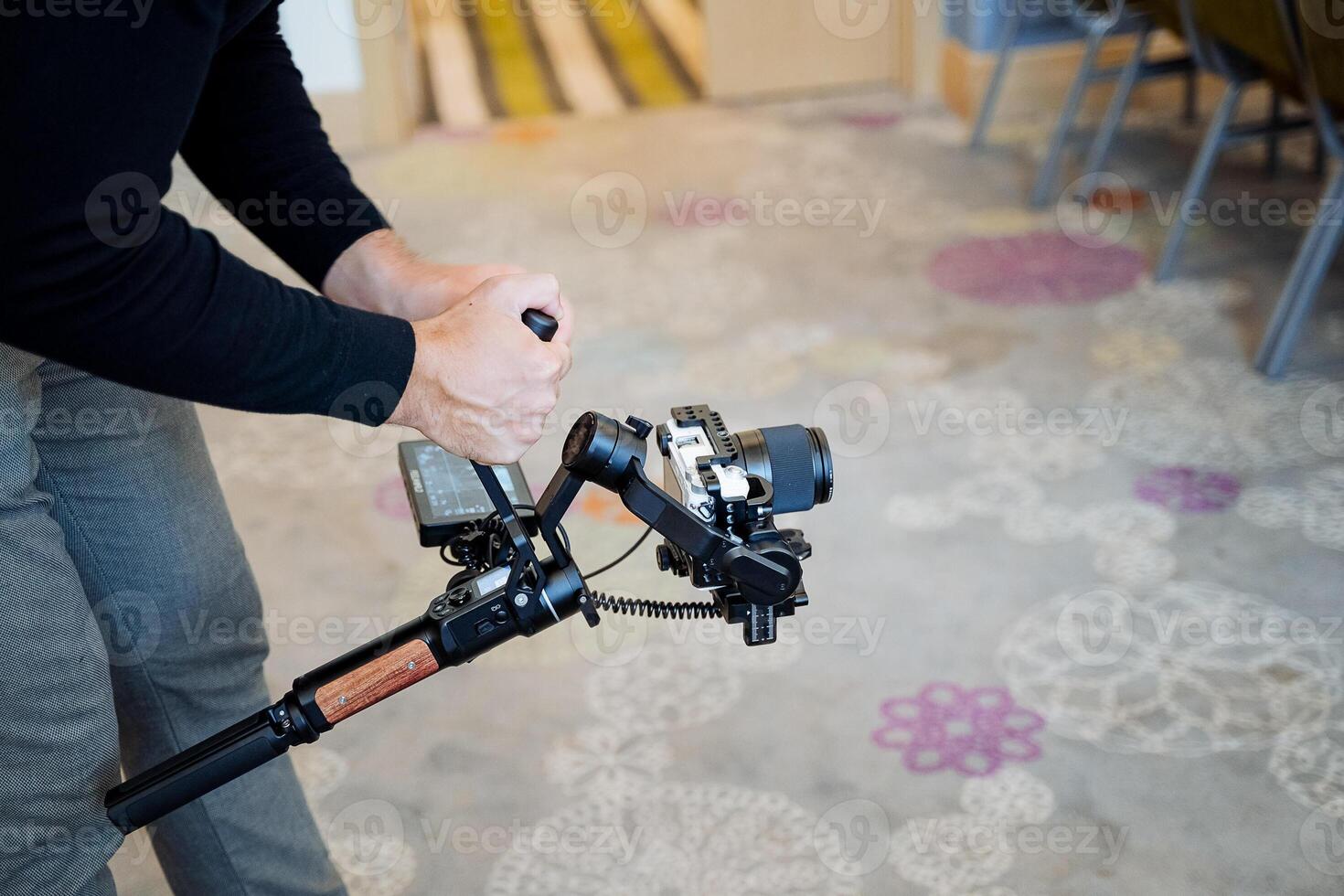 Steadicam special technical equipment for smooth shooting, no image shaking, camera stabilization in the hands of the operator. photo