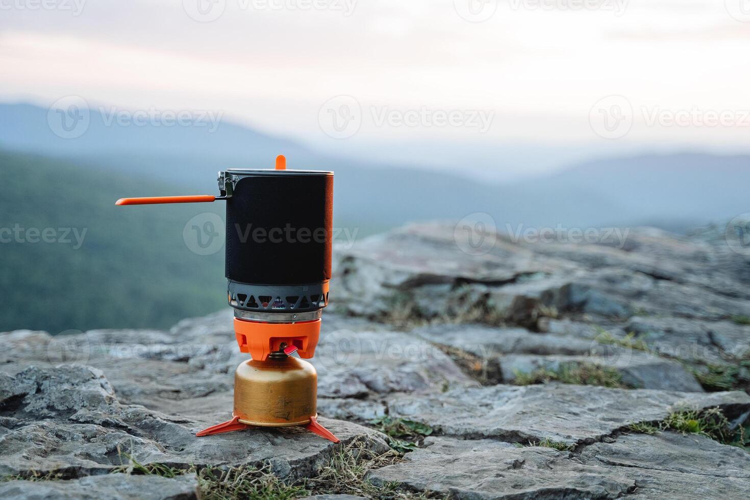 Compact camping gear for camping, camping gas burner, cylinder stand, outdoor cooking photo