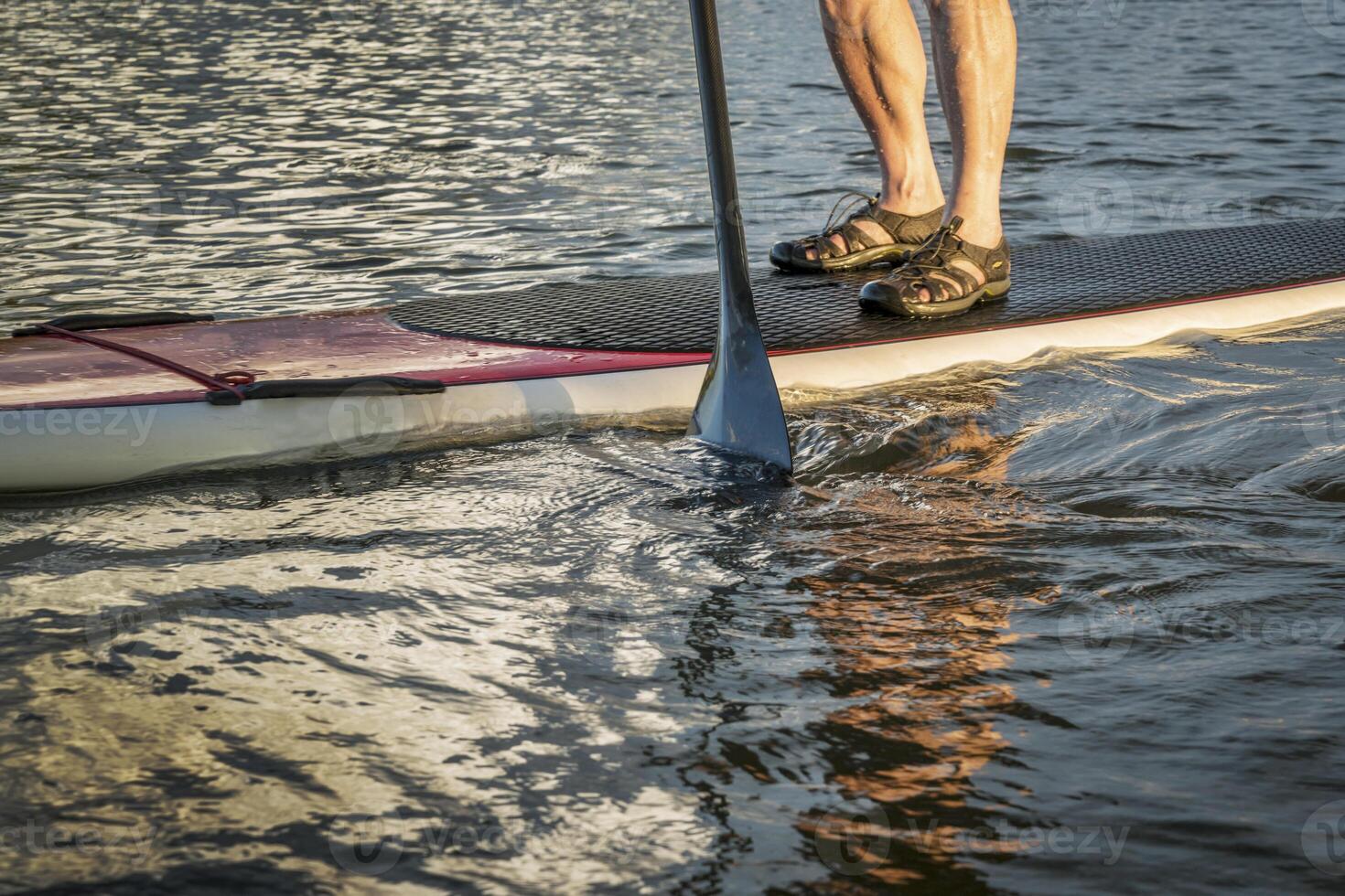 stand up paddling abstract photo