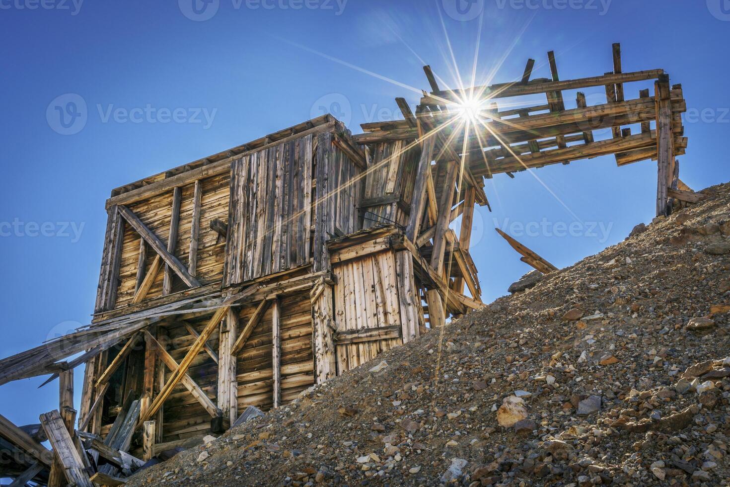 ruins of gold mine in Rocky Mountains photo