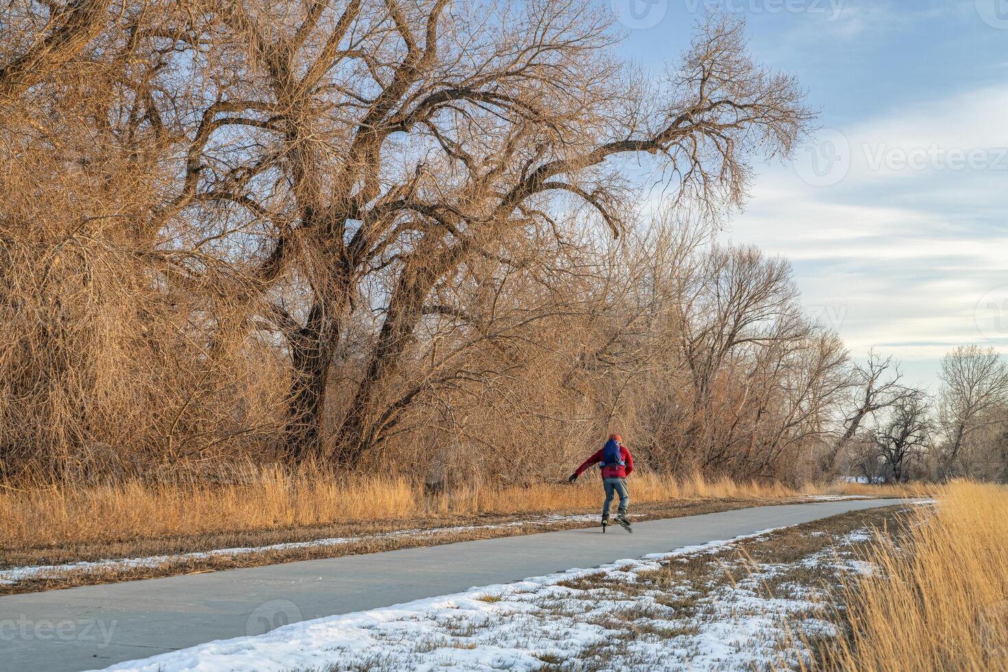 inline skating on a paved bike trail in Colorado photo