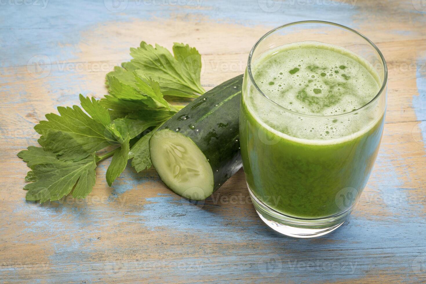 glass of fresh green juice photo