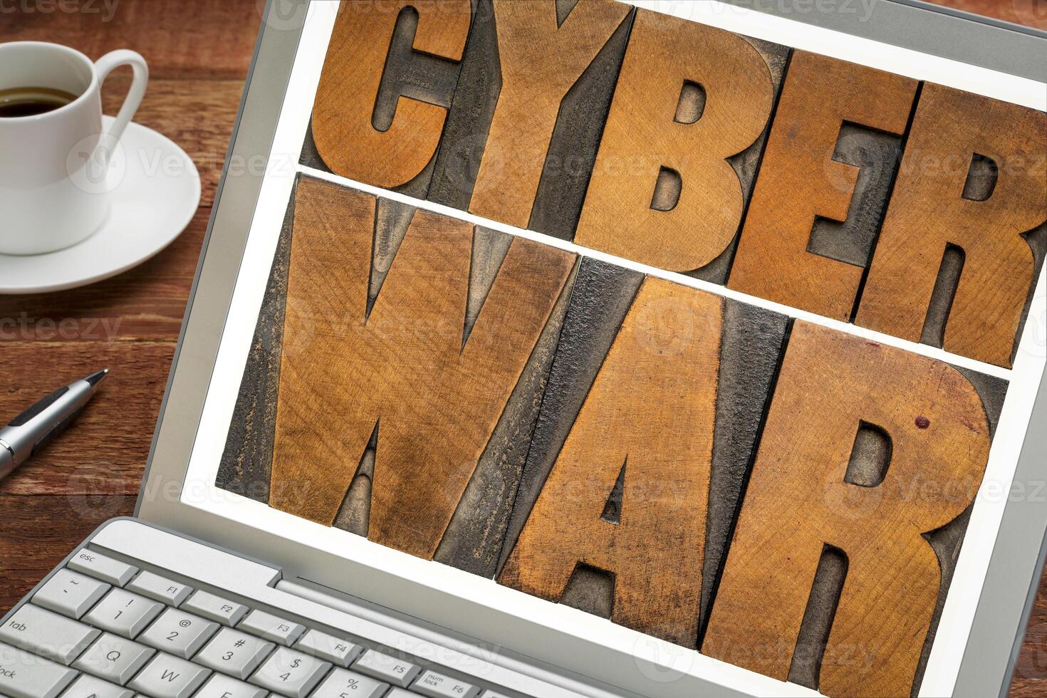 cyber war - word in vintage letterpress wood type photo