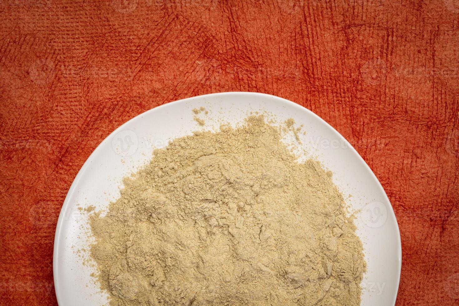 maca root powder on a plate photo