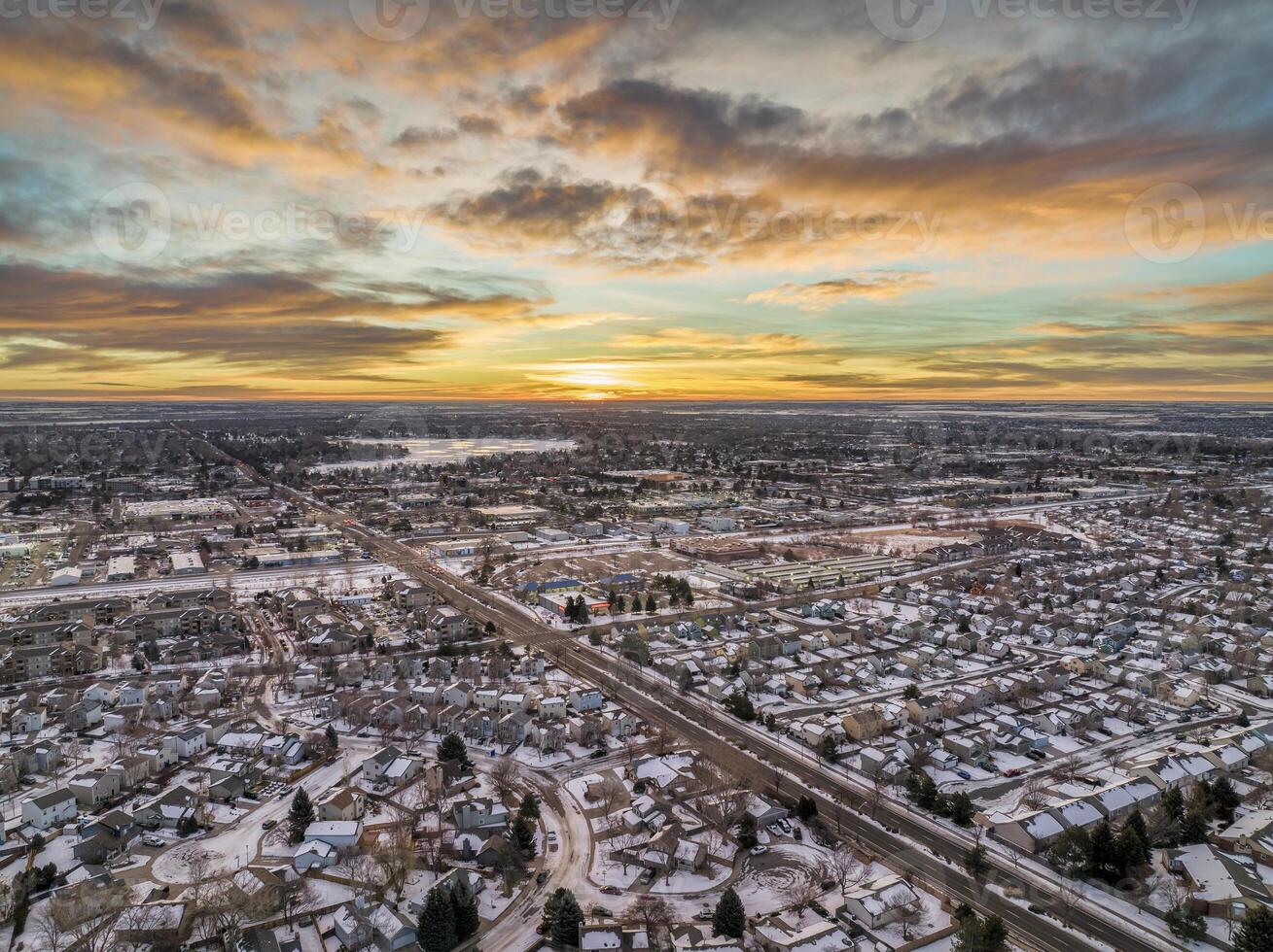 winter sunrise over of Fort Collins and plains in Colorado photo