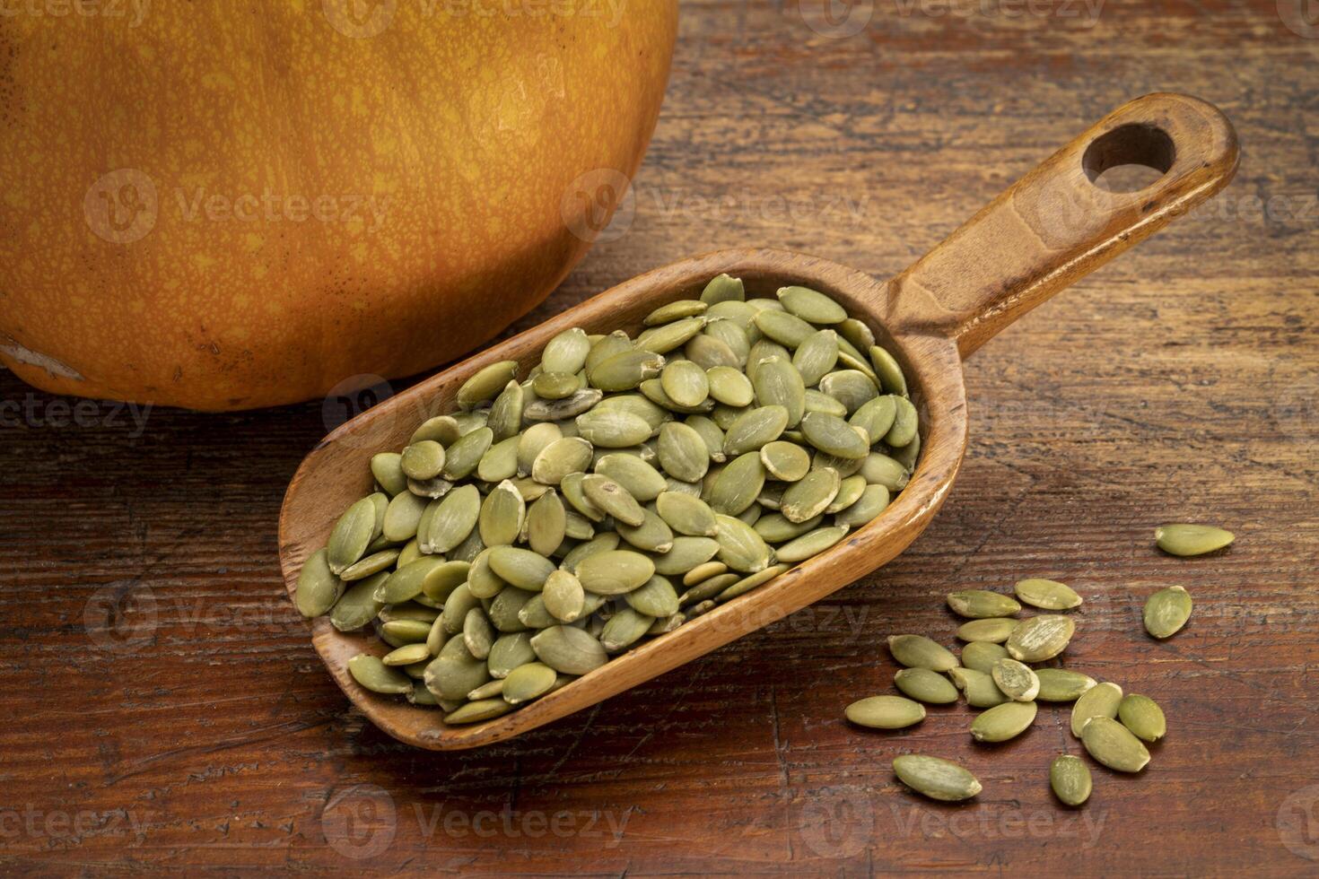 scoop of pumpkin seeds photo