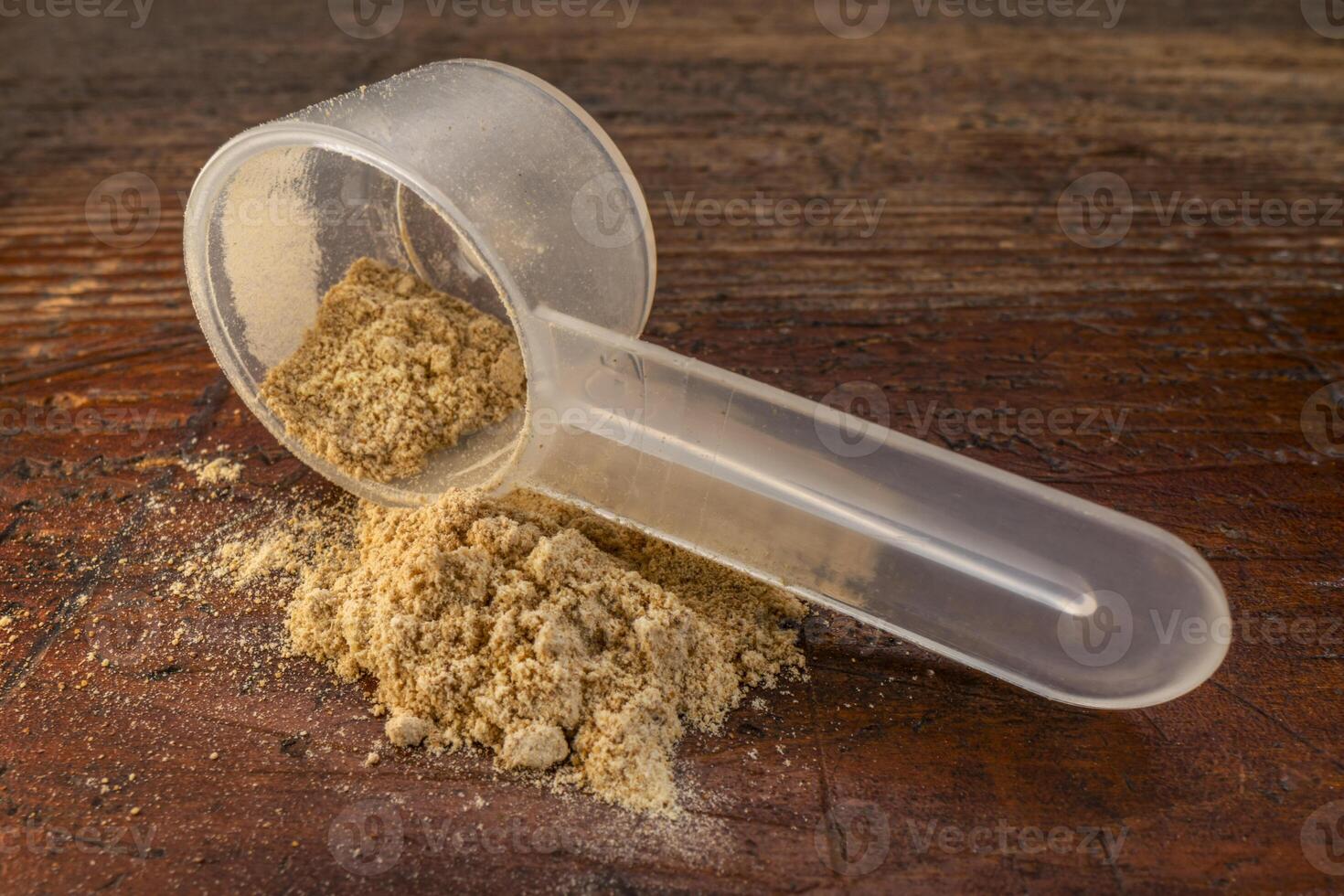 scoop of maca root powder photo