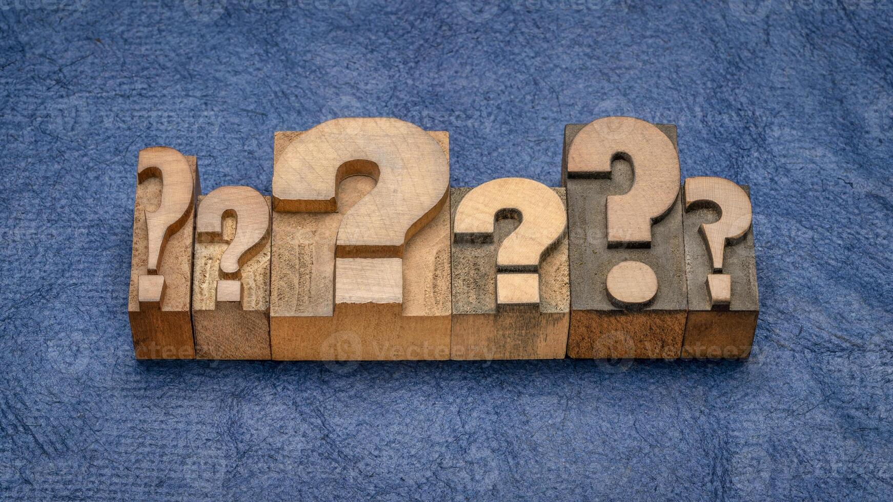 row of question marks in letterpress wood type photo