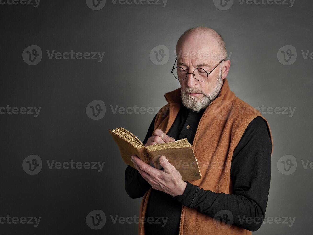 senior man writing a journal photo