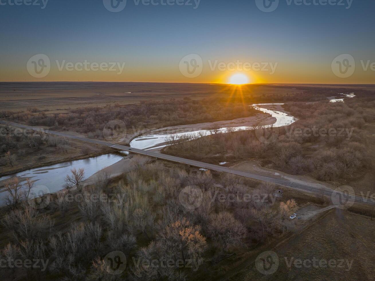 sunset over prairie and the South Platte River in eastern Colorado near Crook, aerial view of late November scenery photo