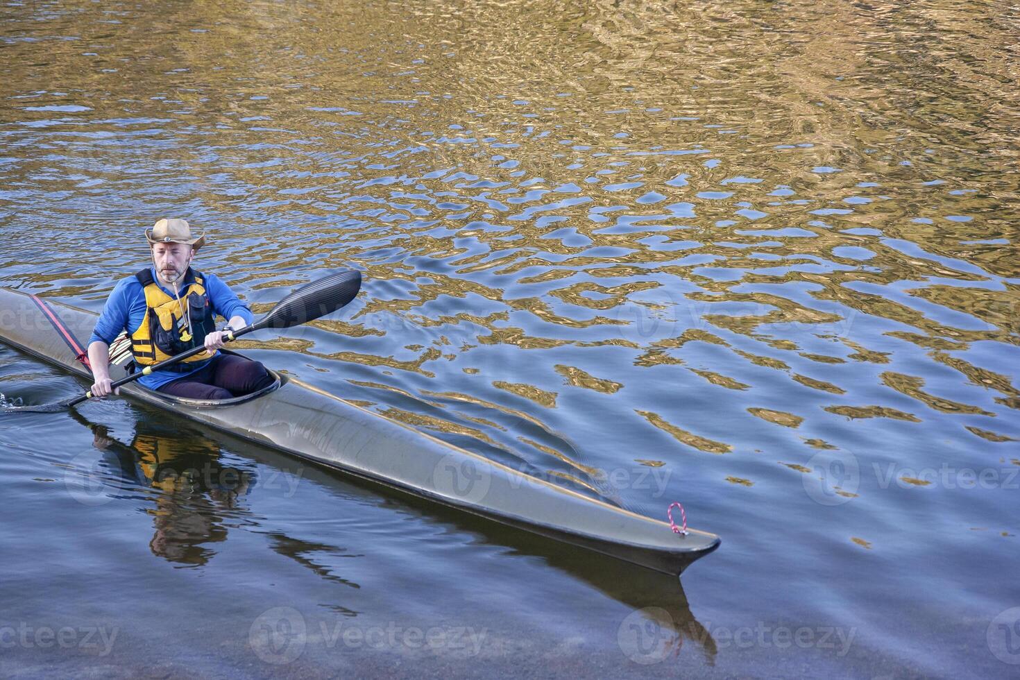 kayak race training on a lake photo