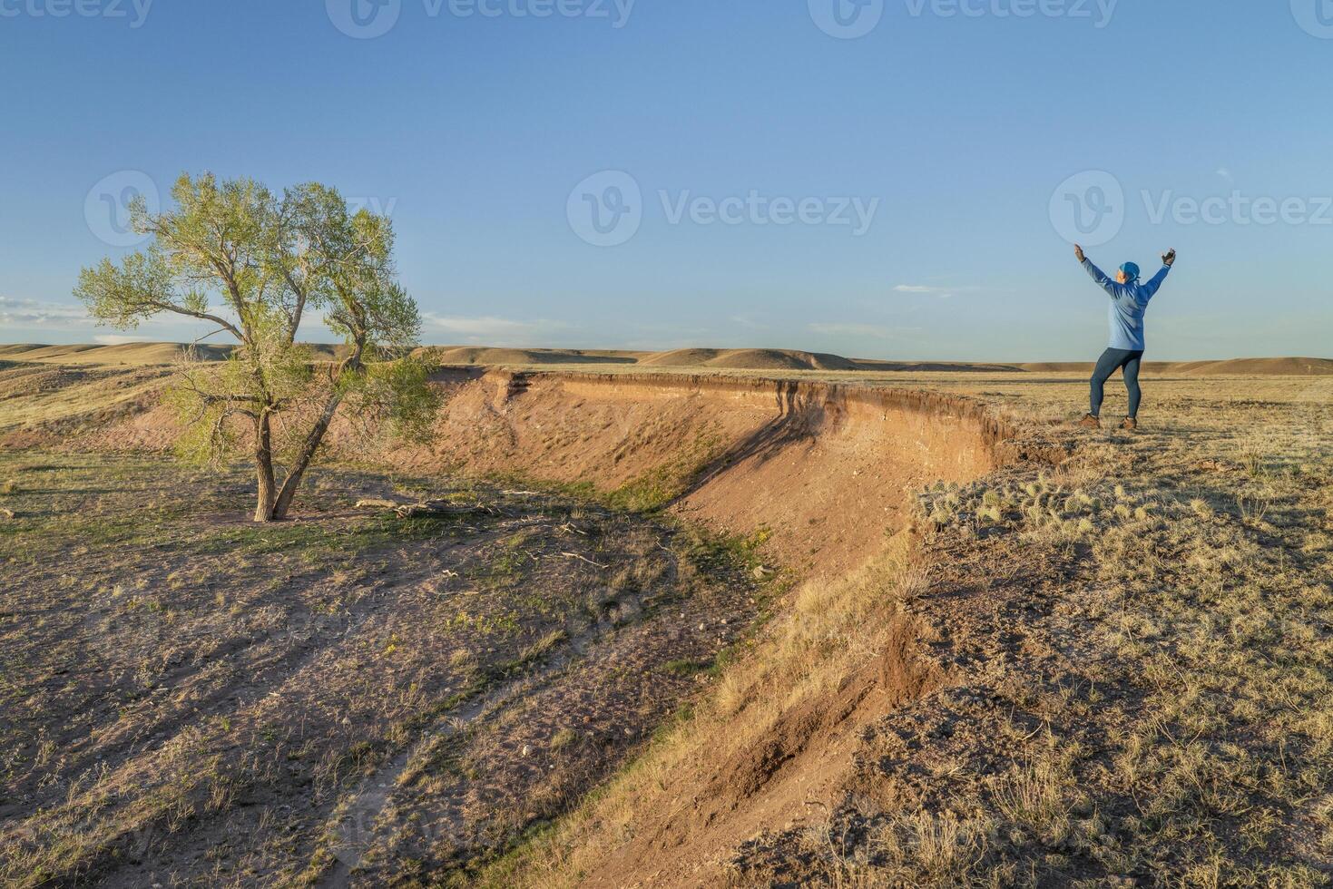 prairie in northern Colorado with a lonely male figure photo