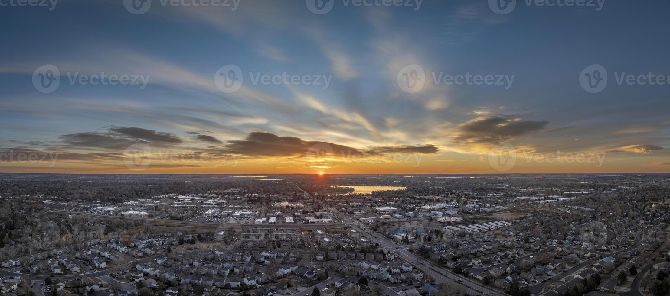 winter sunrise over midtown of Fort Collins and plains in northern Colorado, aerial panorama photo