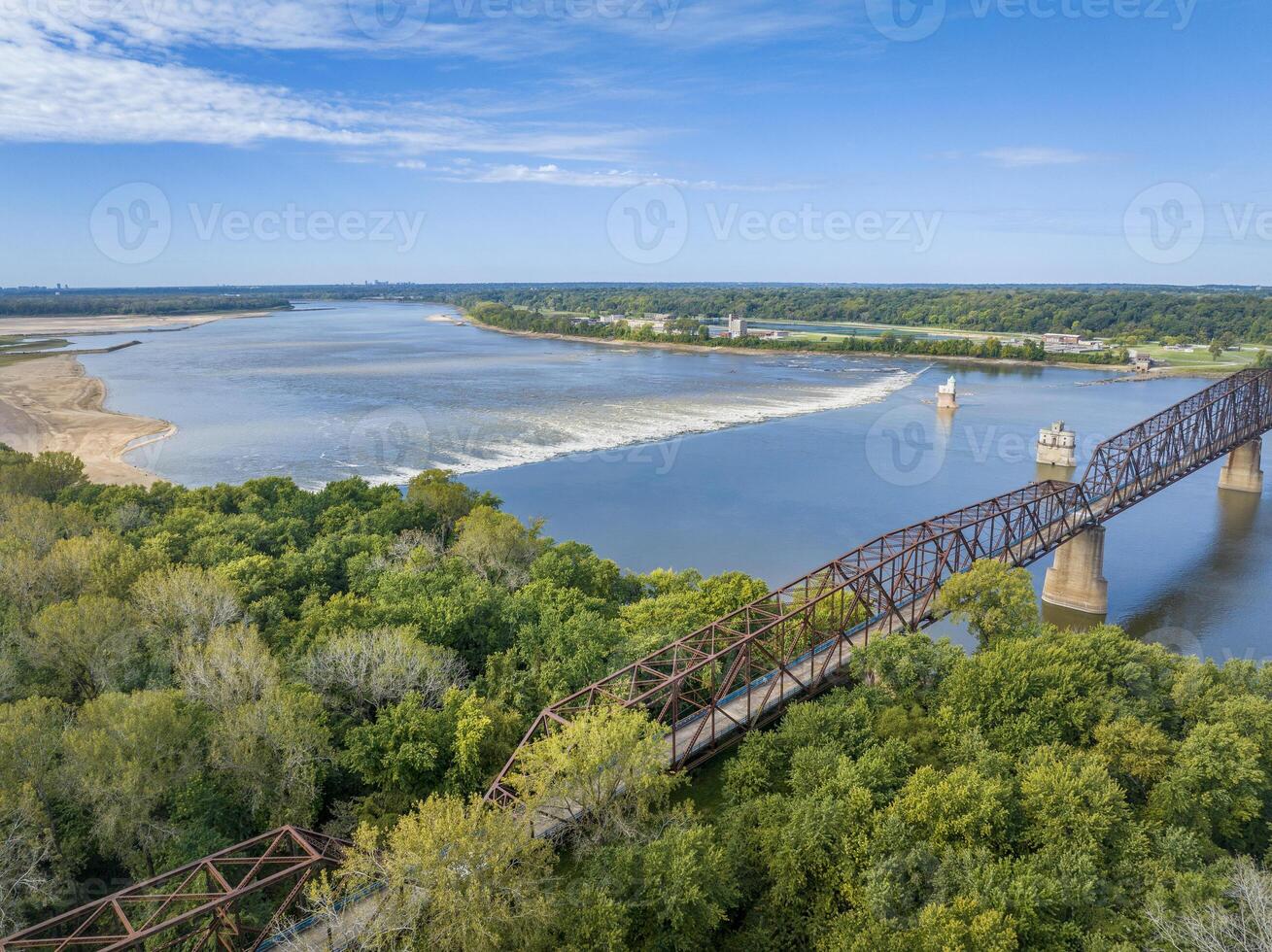 Chain of Rocks on the Mississippi RIver above St Louis with the Low Water Dam, water towers and old historic bridge photo