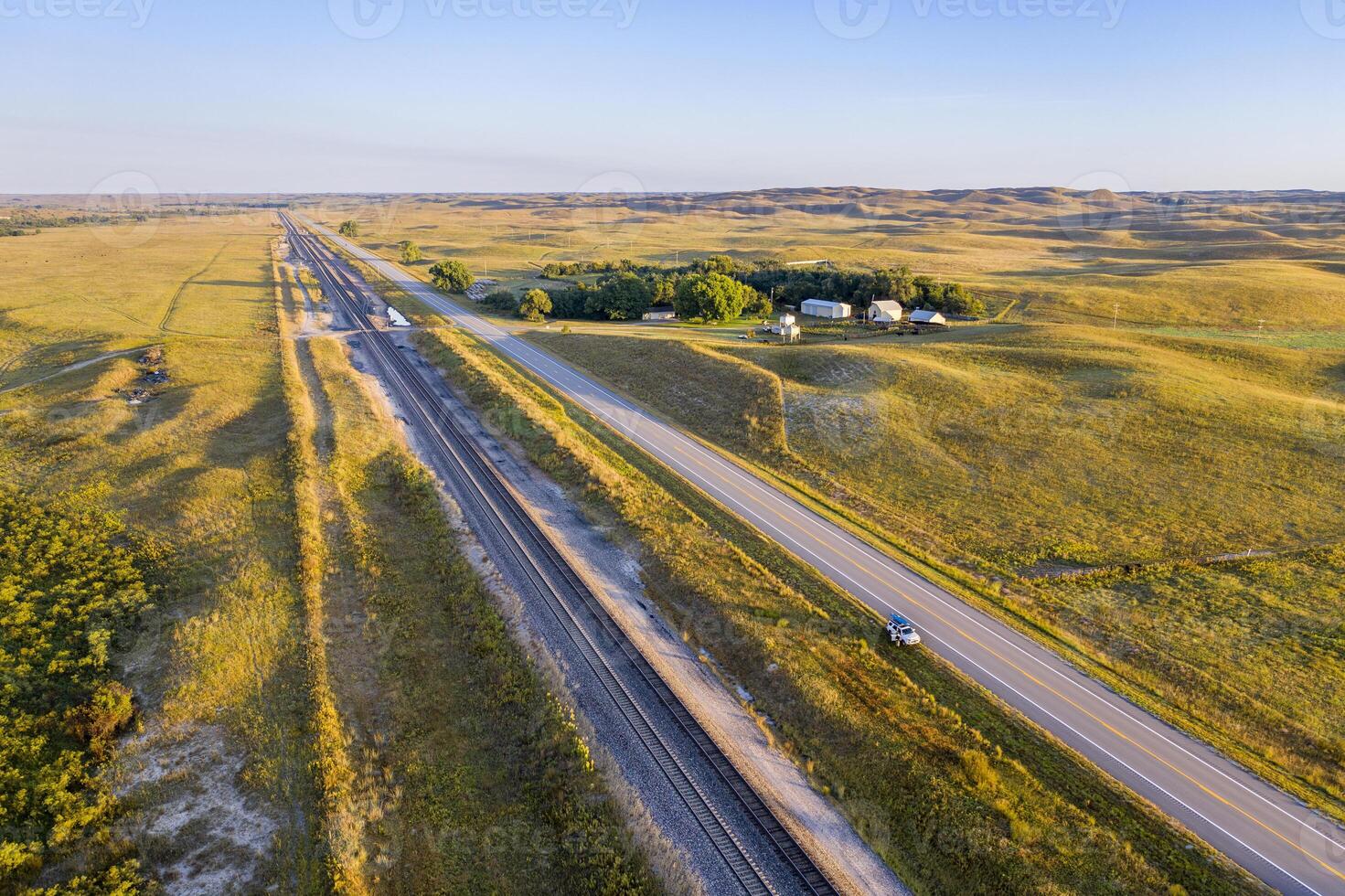 highway and railroad across Nebraska Sandhills along the Middle Loup River, aerial view photo