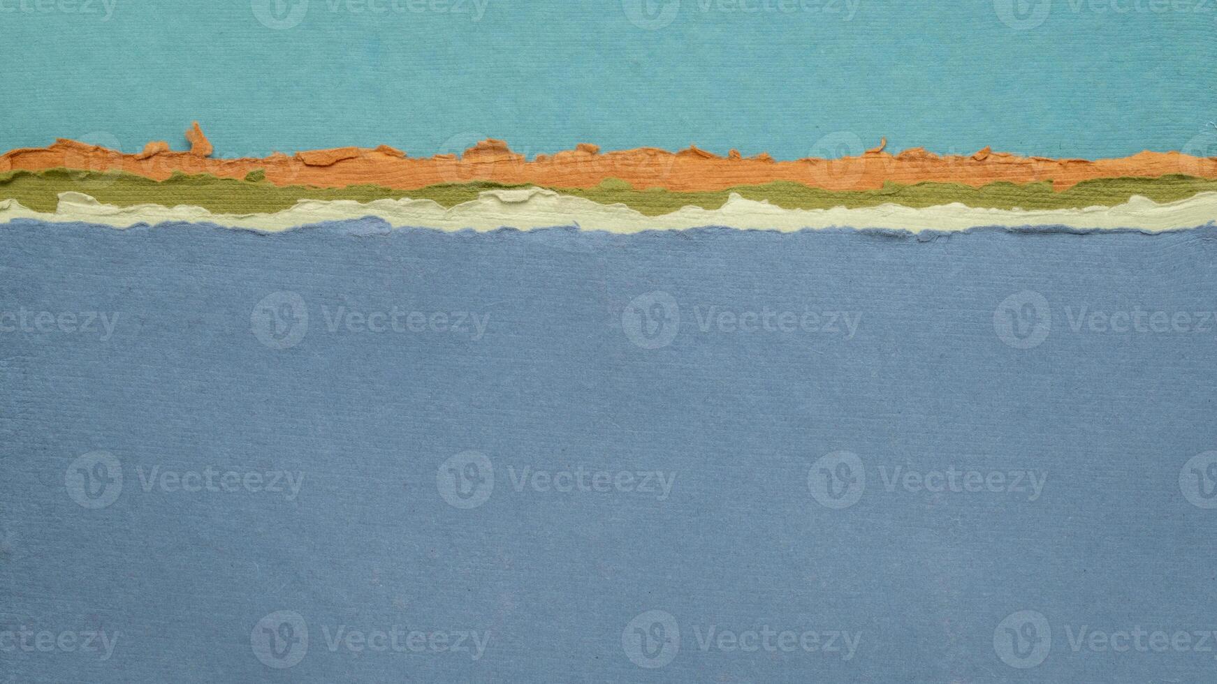abstract landscape in pastel tones with a blue sky and ocean - a collection of handmade rag papers photo