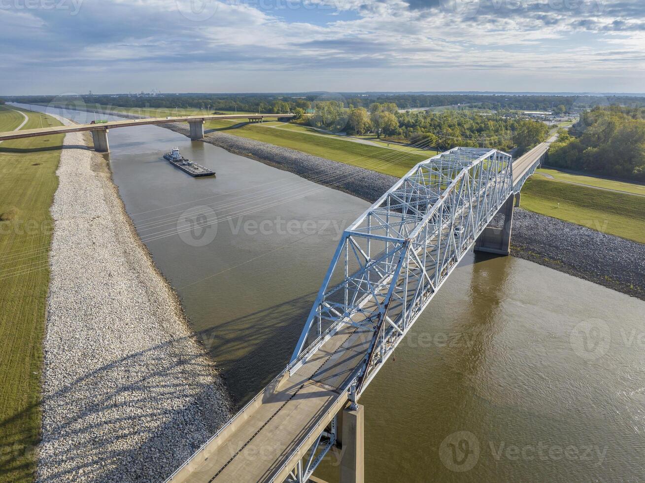 towboats with barges on Chain of Rock Canal of Mississipi River above St Louis, aerial view in October scenery photo