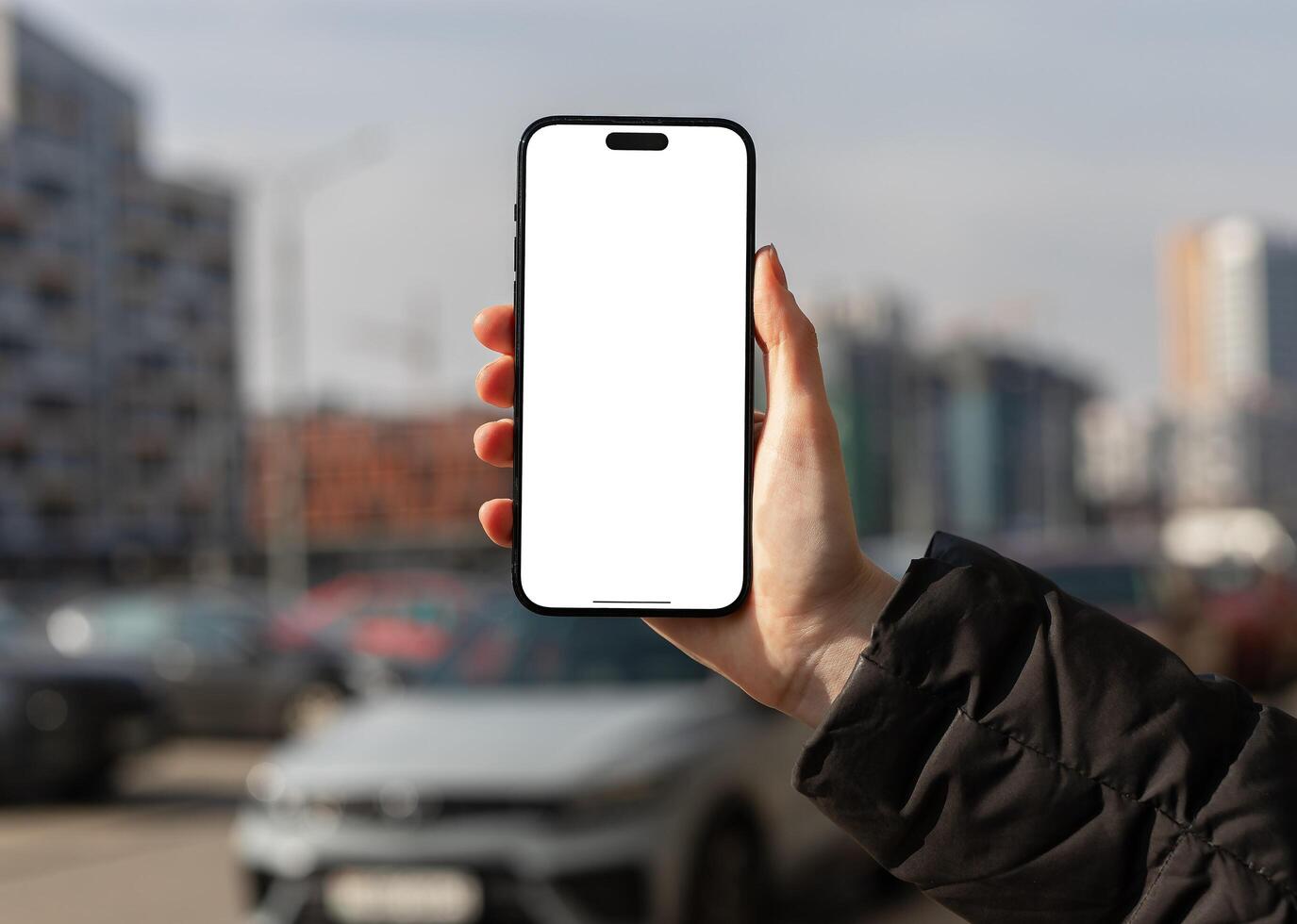 Berlin Germany January 21 2024 Hand showing mobile phone screen mockup, iphone mock up photo