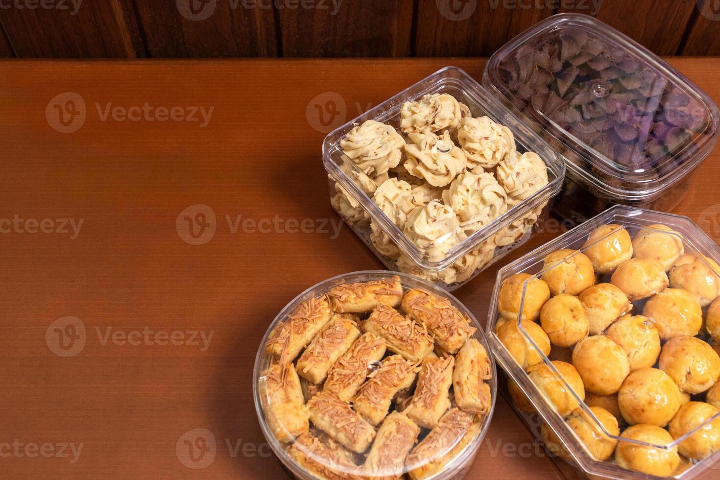 Various dried cakes on wooden table. After some edits. photo