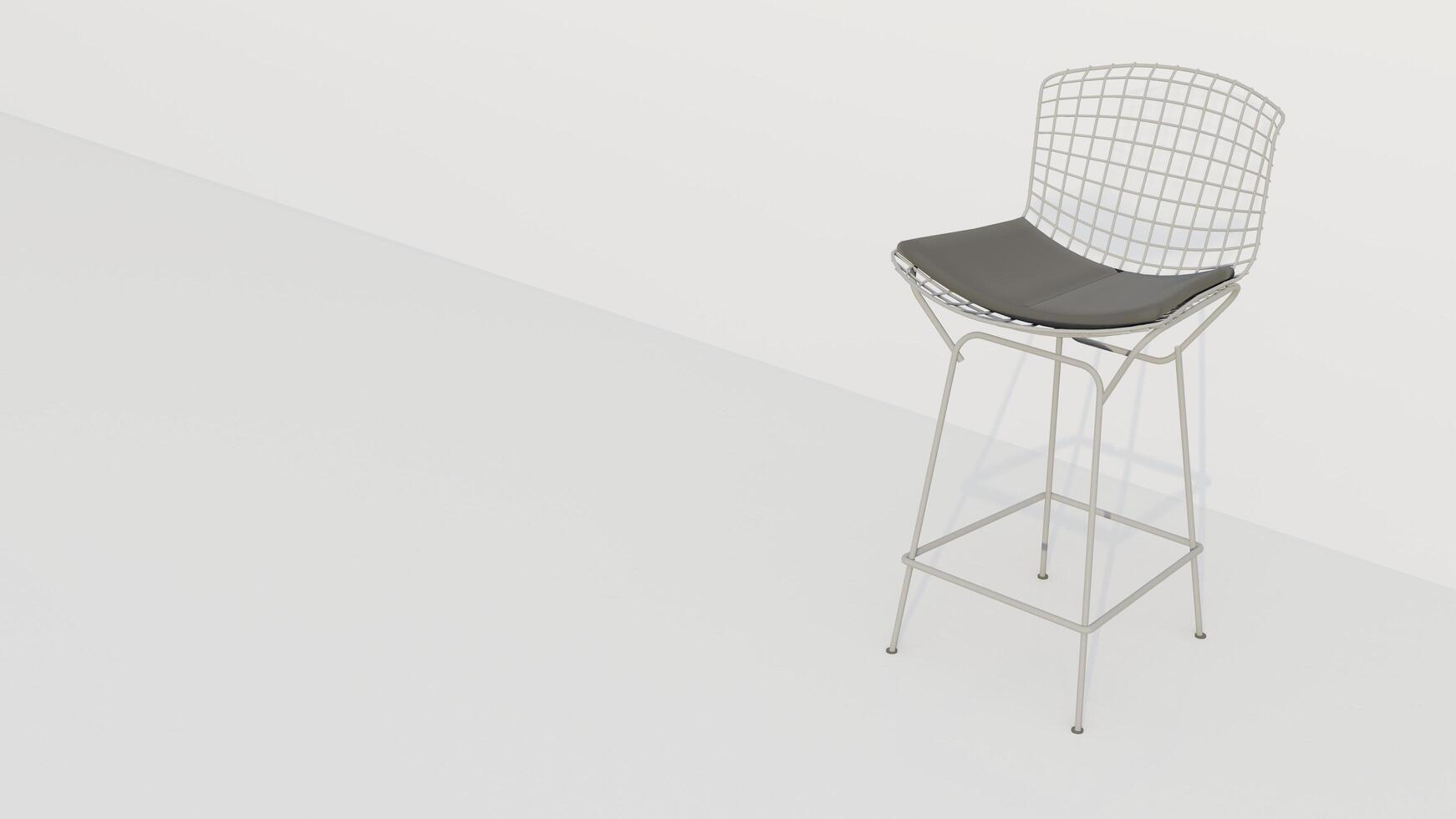 A white chair with a black cushion sits on a white wall photo