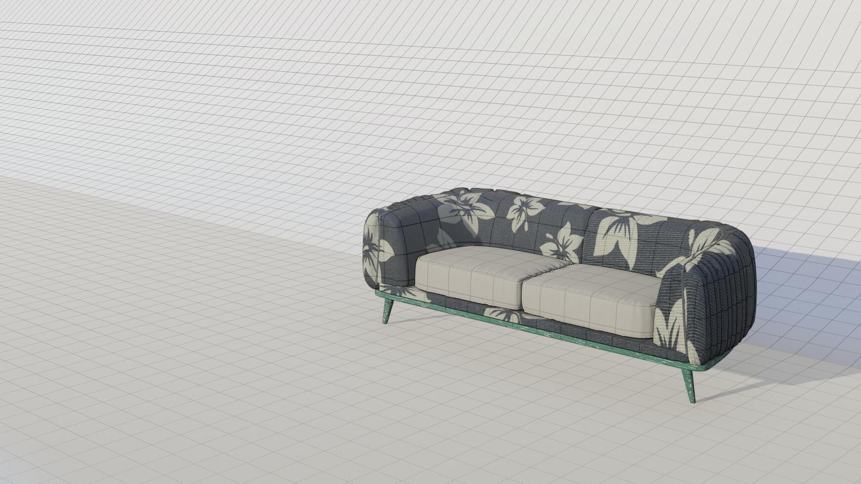 A blue and white couch with a floral pattern photo