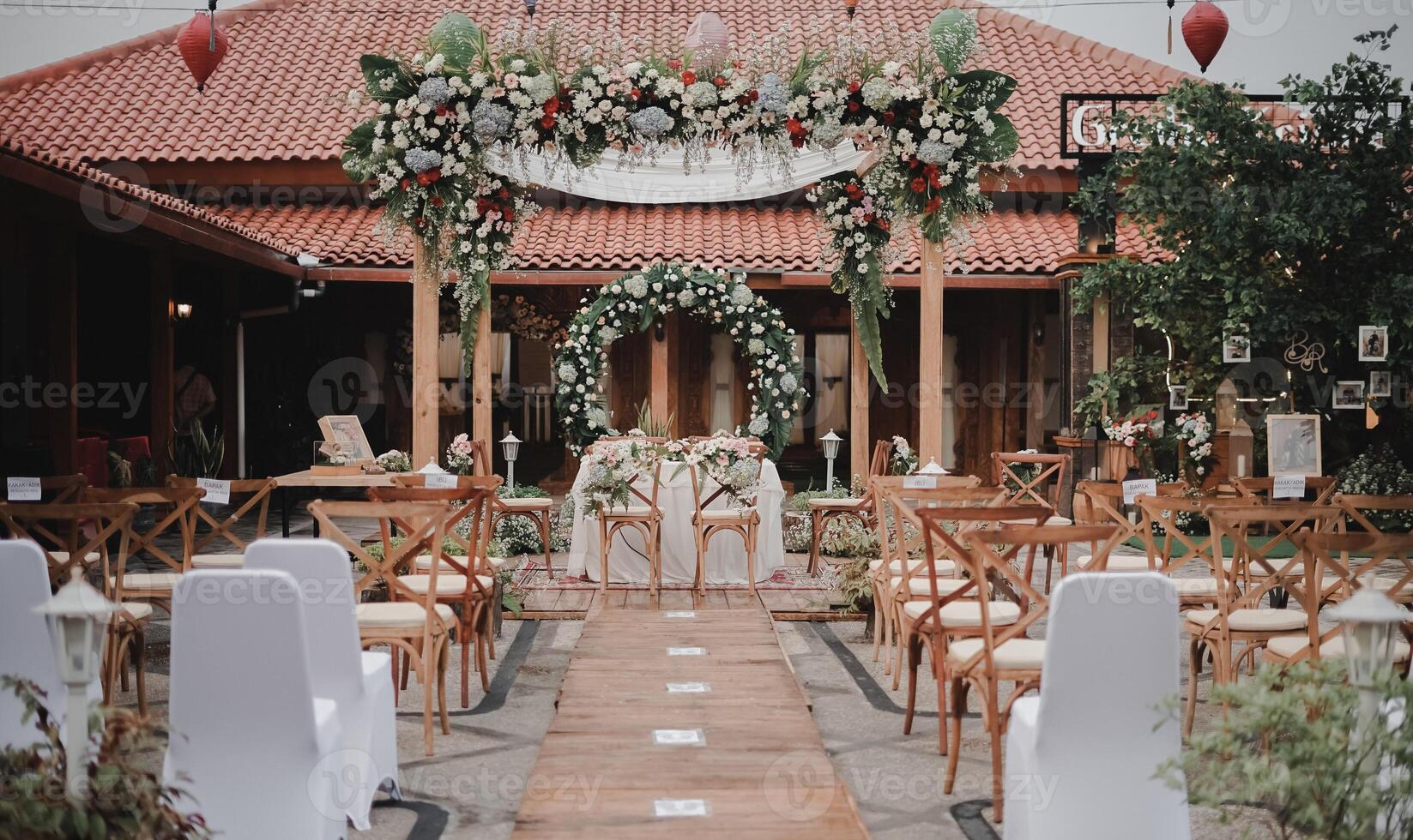 location for a wedding ceremony in an open building, with an archway and flowers, wedding concept photo