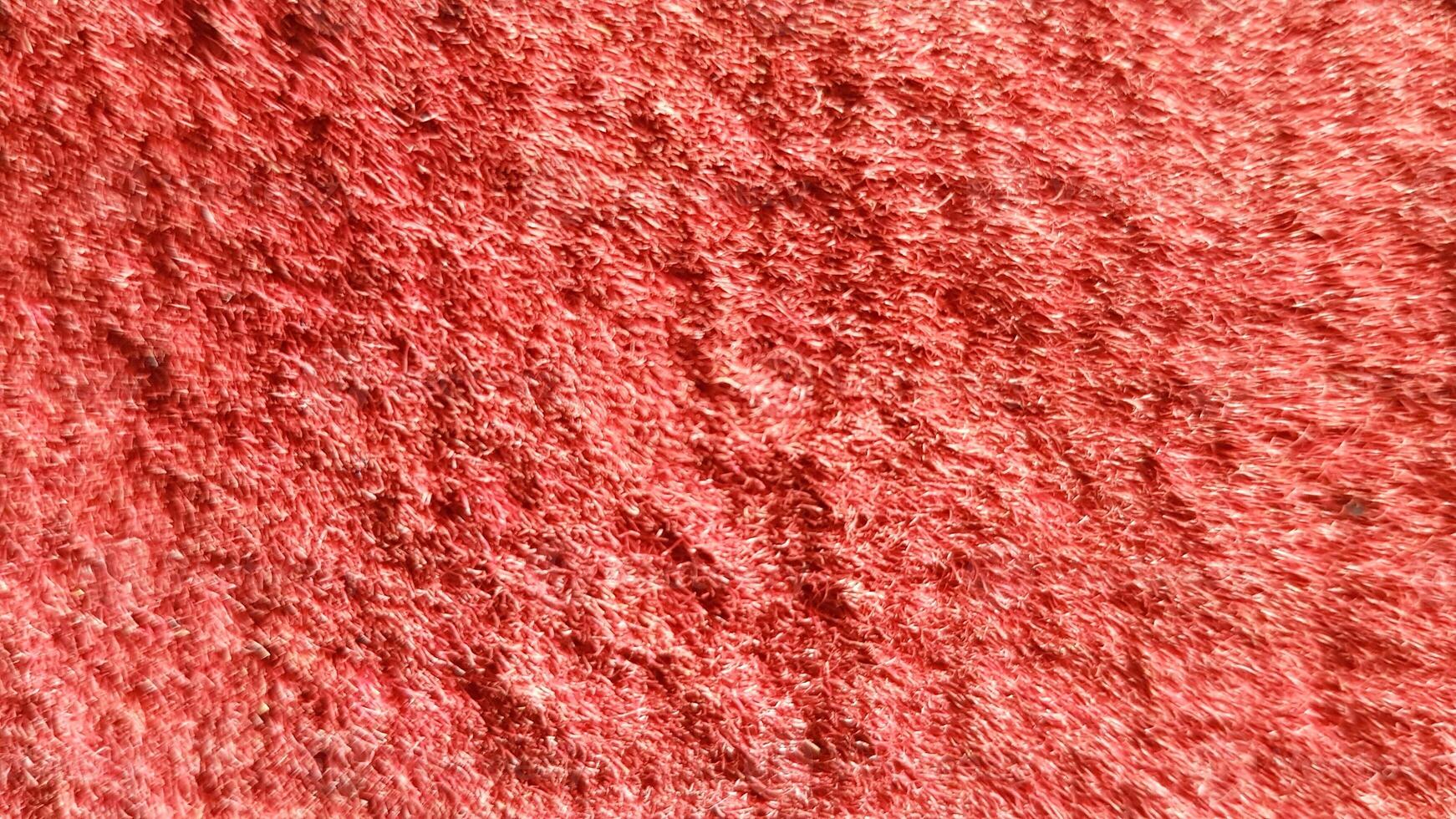 Red synthetic fabrics background, Background and Texture Concept photo