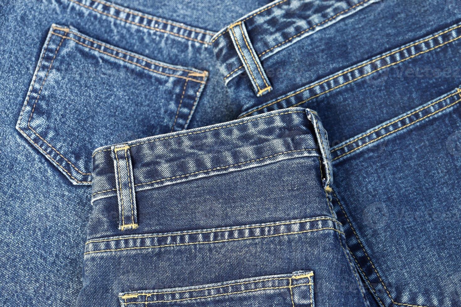 beautiful fashion jeans Stacked in layers at the jeans store photo