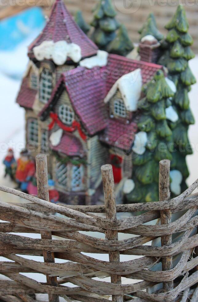 Natural Wattle Fence In Front Blurred Souvenir House Vertical Stock Photo