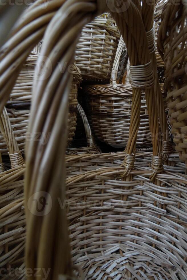 Braided handles of wicker baskets closeup view photo