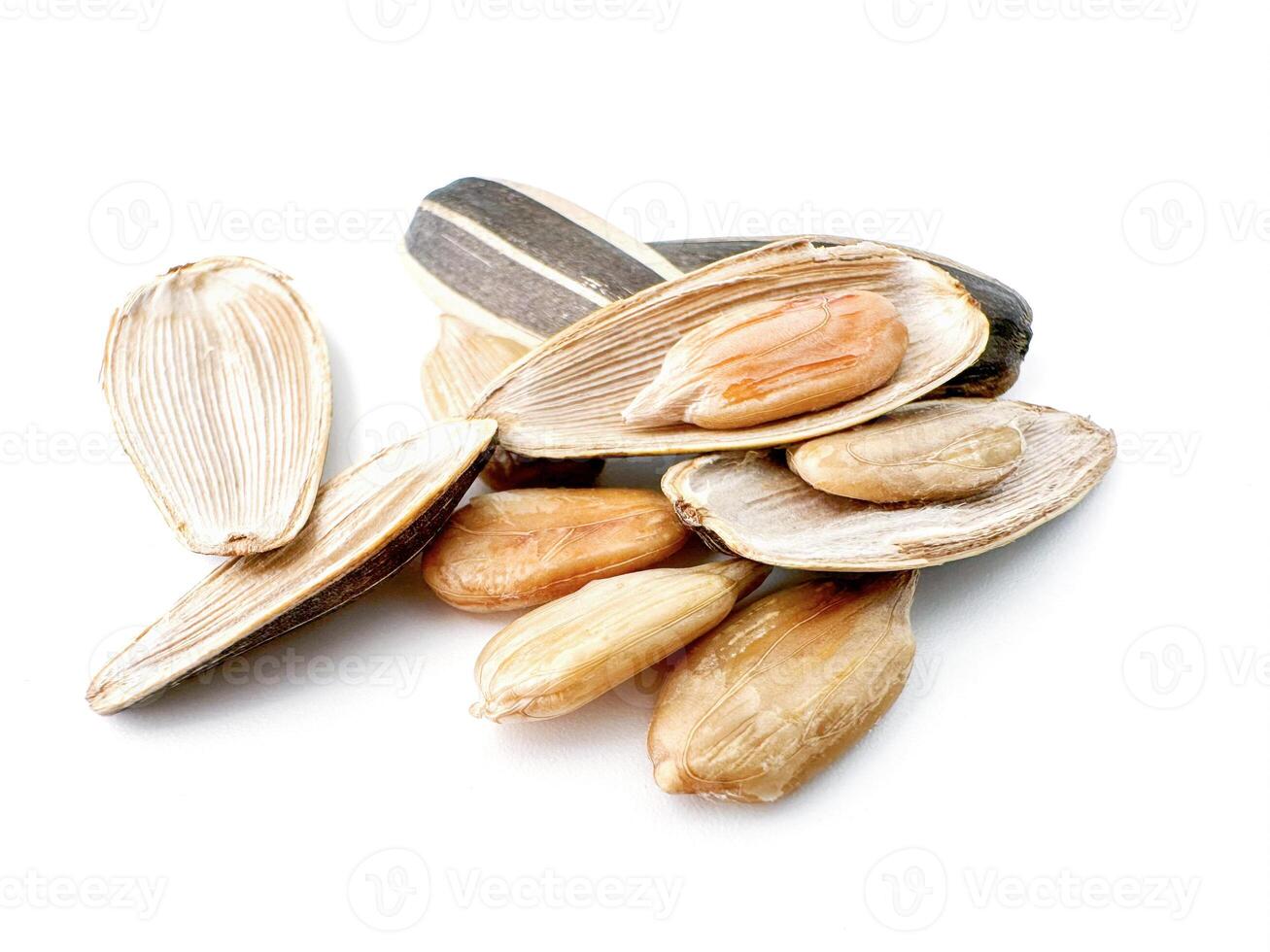 Close-up of delicious black sunflower seeds Natural agricultural seeds isolated on white background. photo