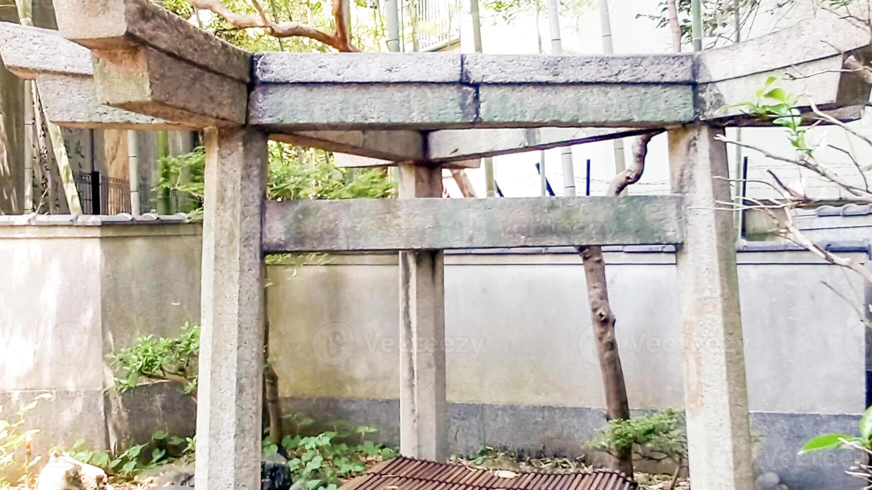 three pillar torii.Mimeguri Shrine is a shrine located in Mukojima, Sumida Ward, Tokyo, Japan. photo