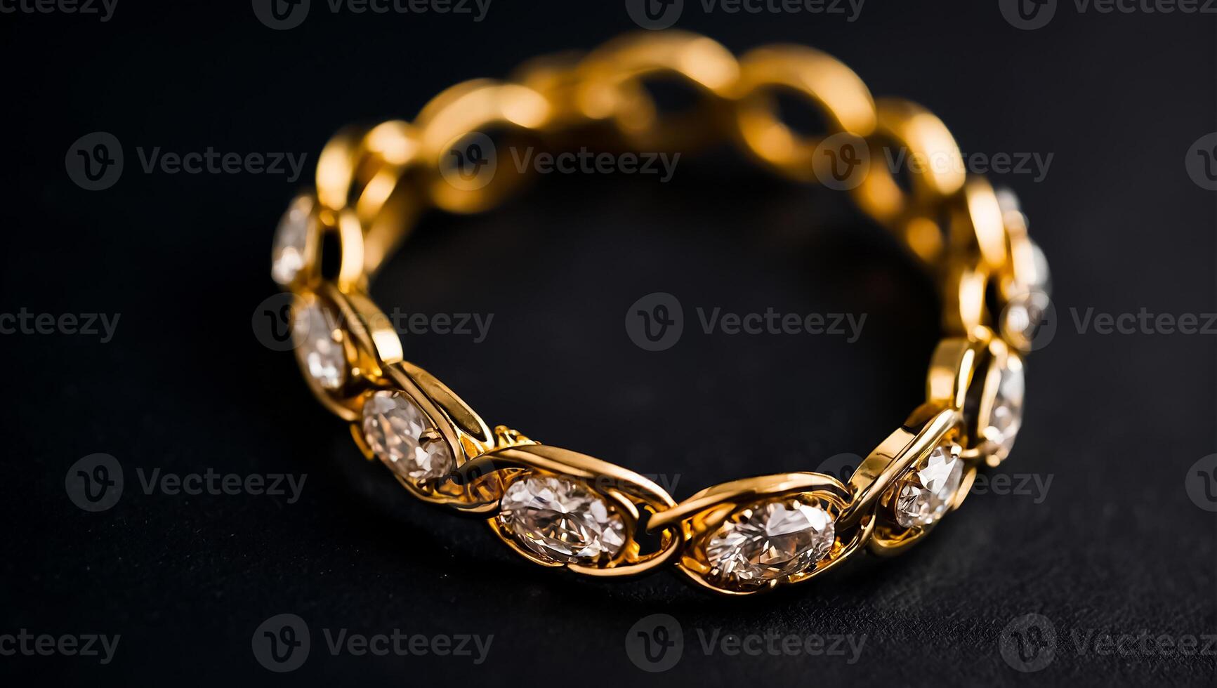 chic gold bracelet on a dark background photo