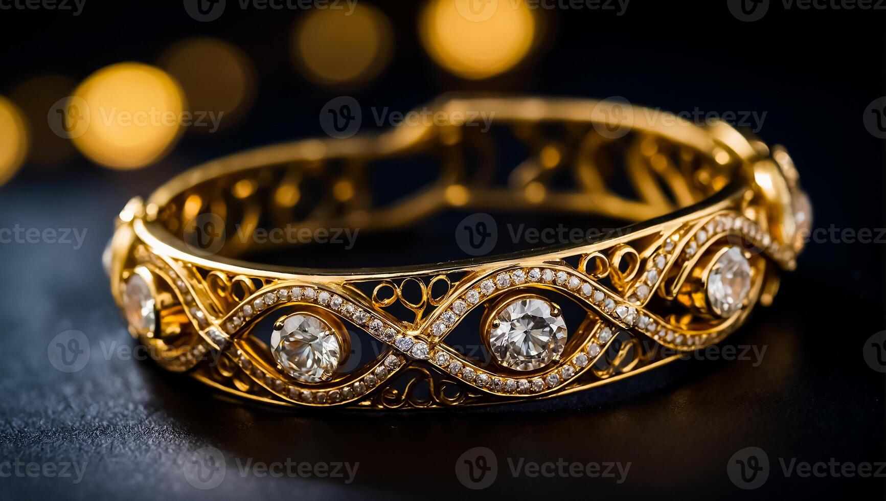 chic gold bracelet on a dark background photo