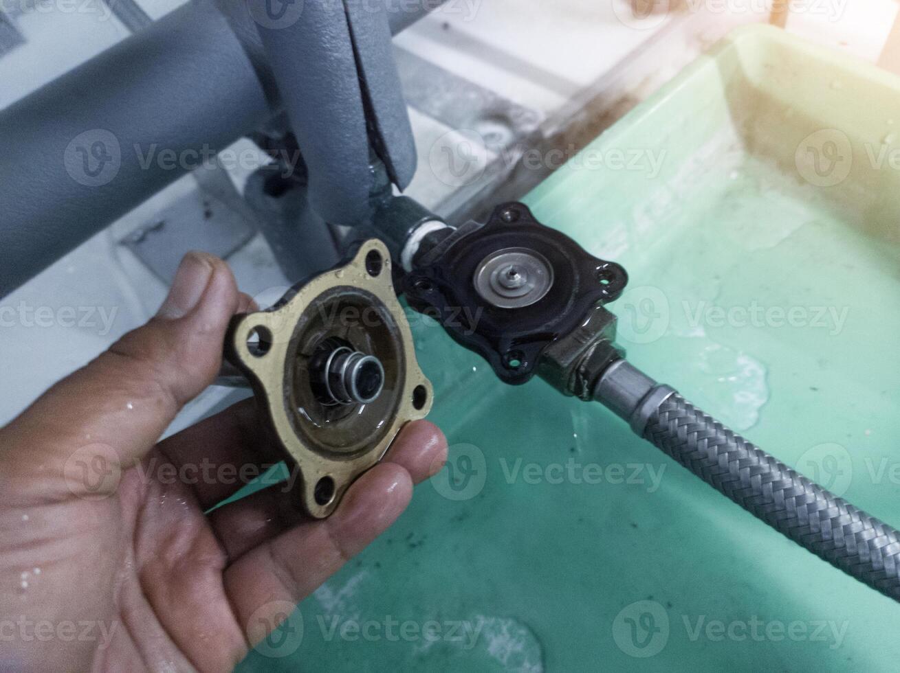 Check and Repair selonoid Valve in water line cooling system. photo