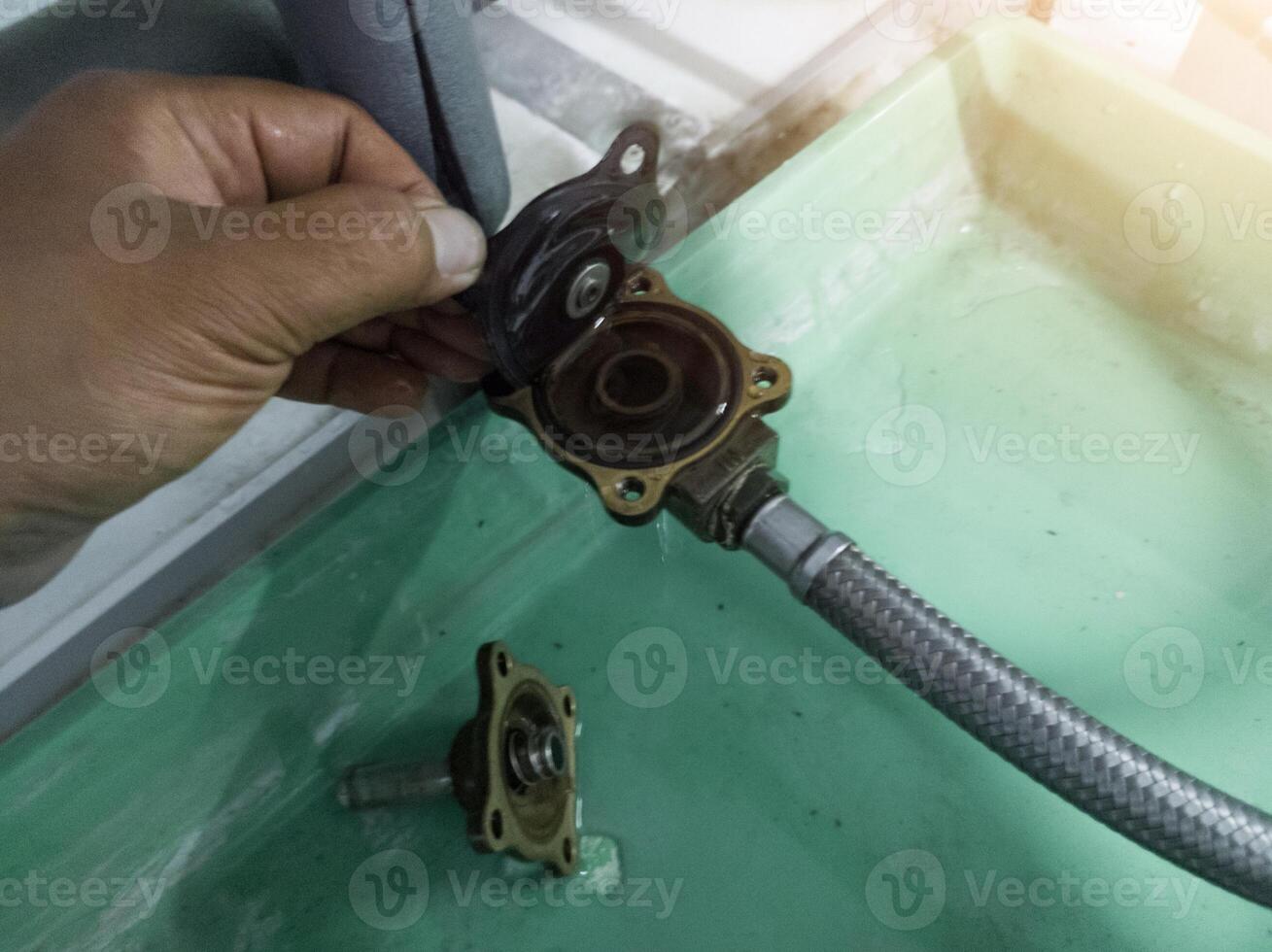 Check and Repair selonoid Valve in water line cooling system. photo