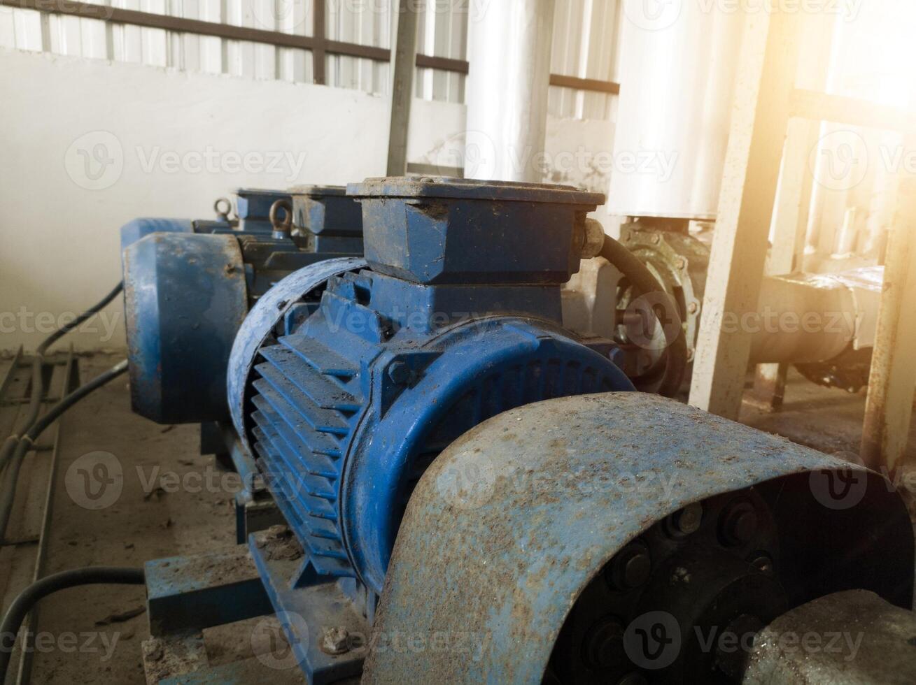 Industrial pump motor induction on water chiller system. photo