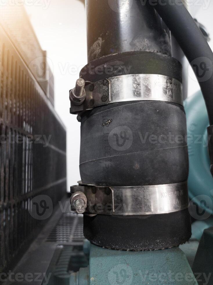 Use of Stainless steel T bolt clamps in rubber hose pipe connections. photo