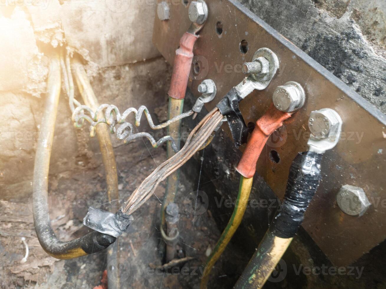 Burnt ground cable, failure in the industrial electrical installation grounding system. Failure earth system concept. photo