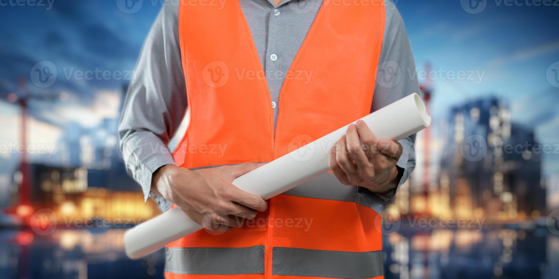 Engineer holding construction blueprint template for building, house, checking accuracy. photo