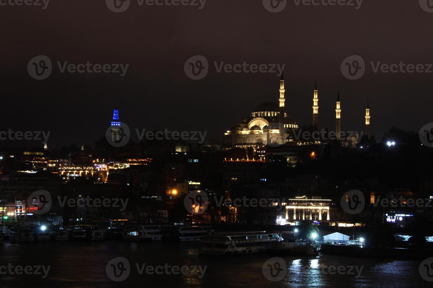 Suleymaniye mosque with a crescent moon in the background. Happy the 27th day of Ramadan or laylat al-qadr. photo