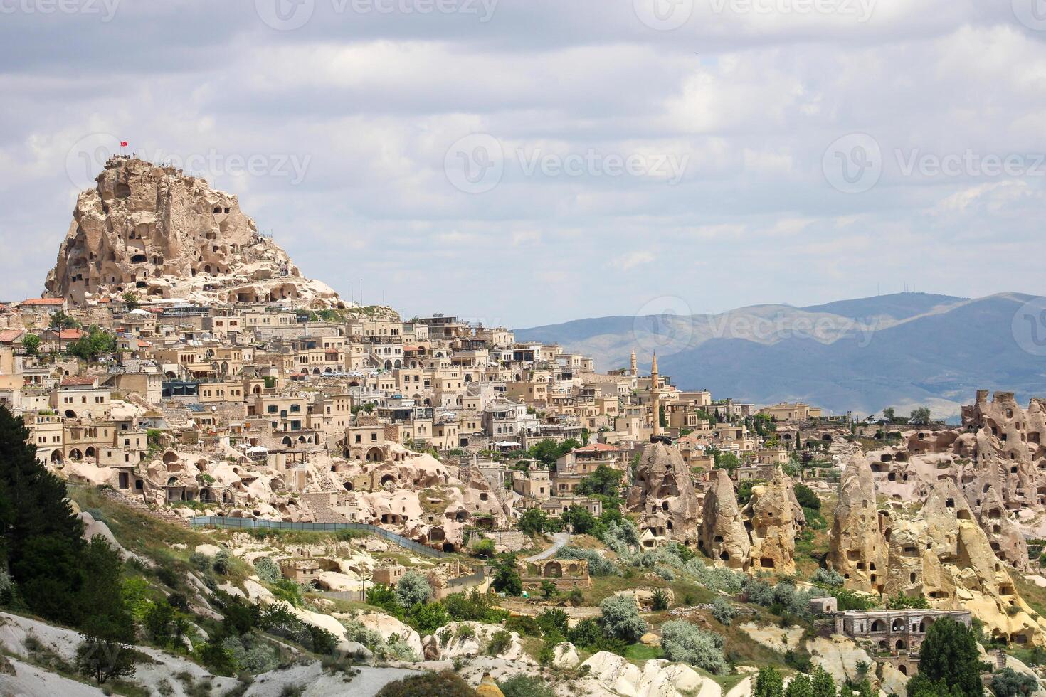 Cappadocia Uchisar Castle is a magnificent view at sunset. Nevsehir,Turkey. photo